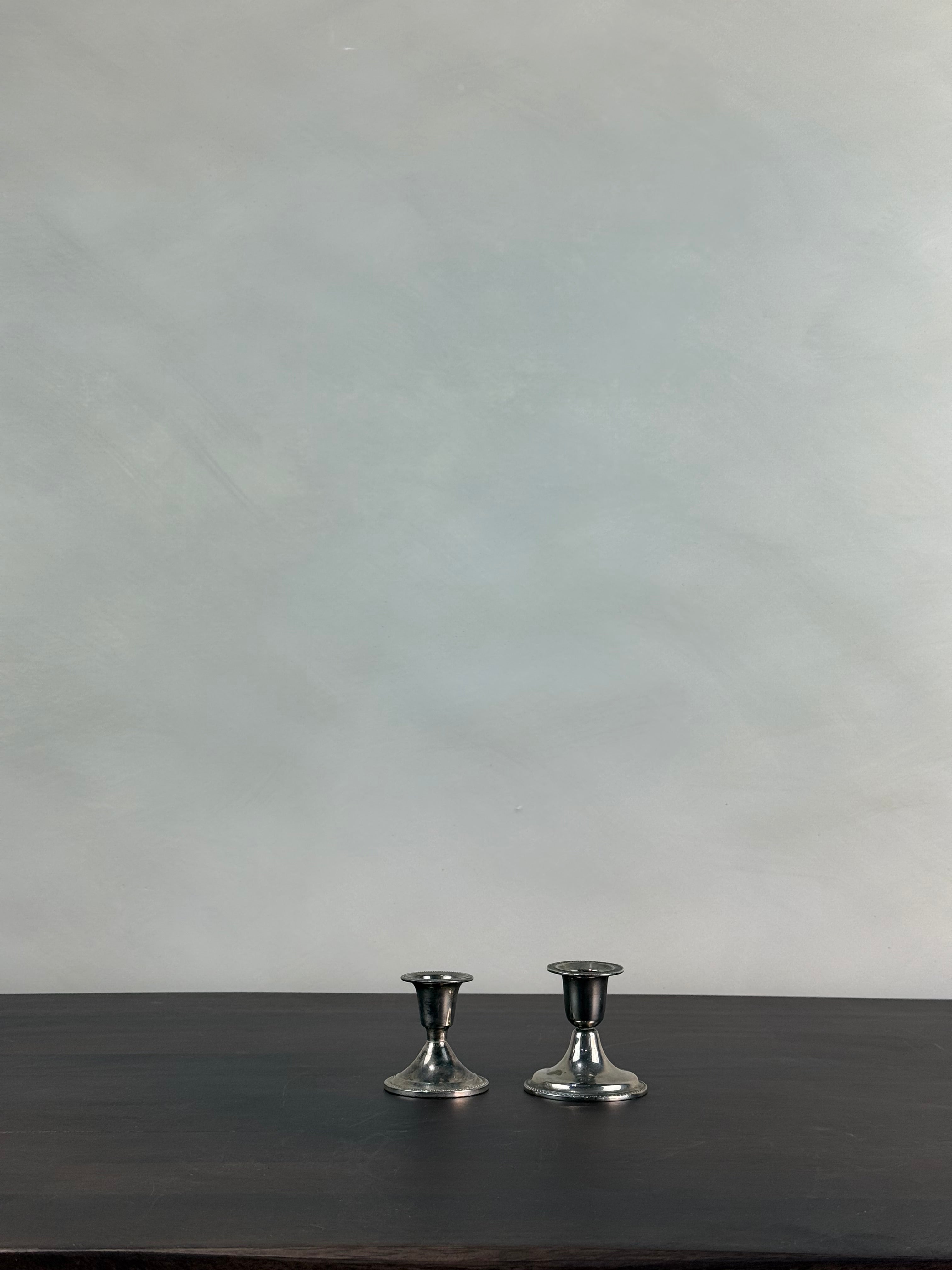 SMALL CHROME CANDLESTICKS