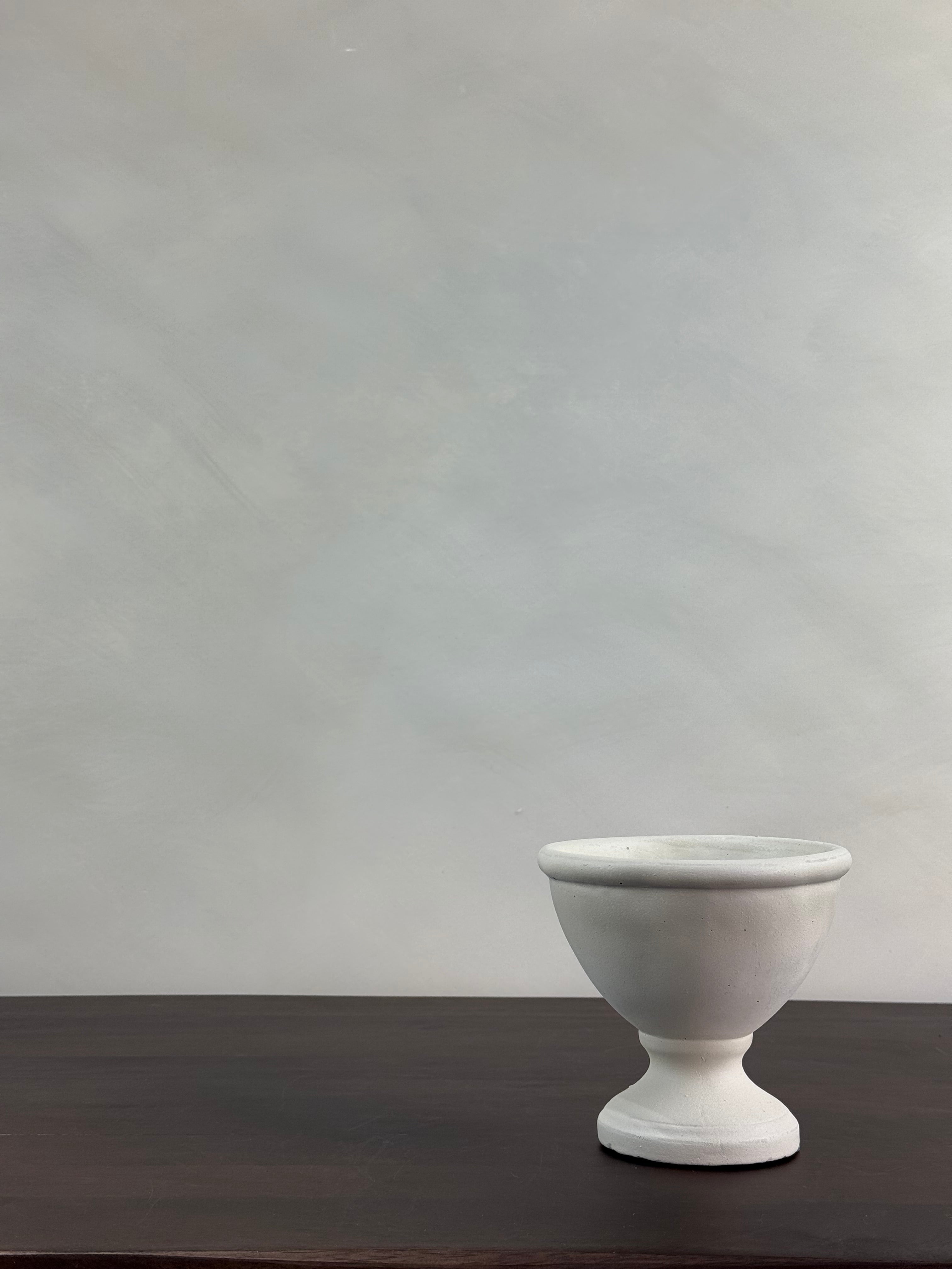WHITE PEDESTAL VESSEL