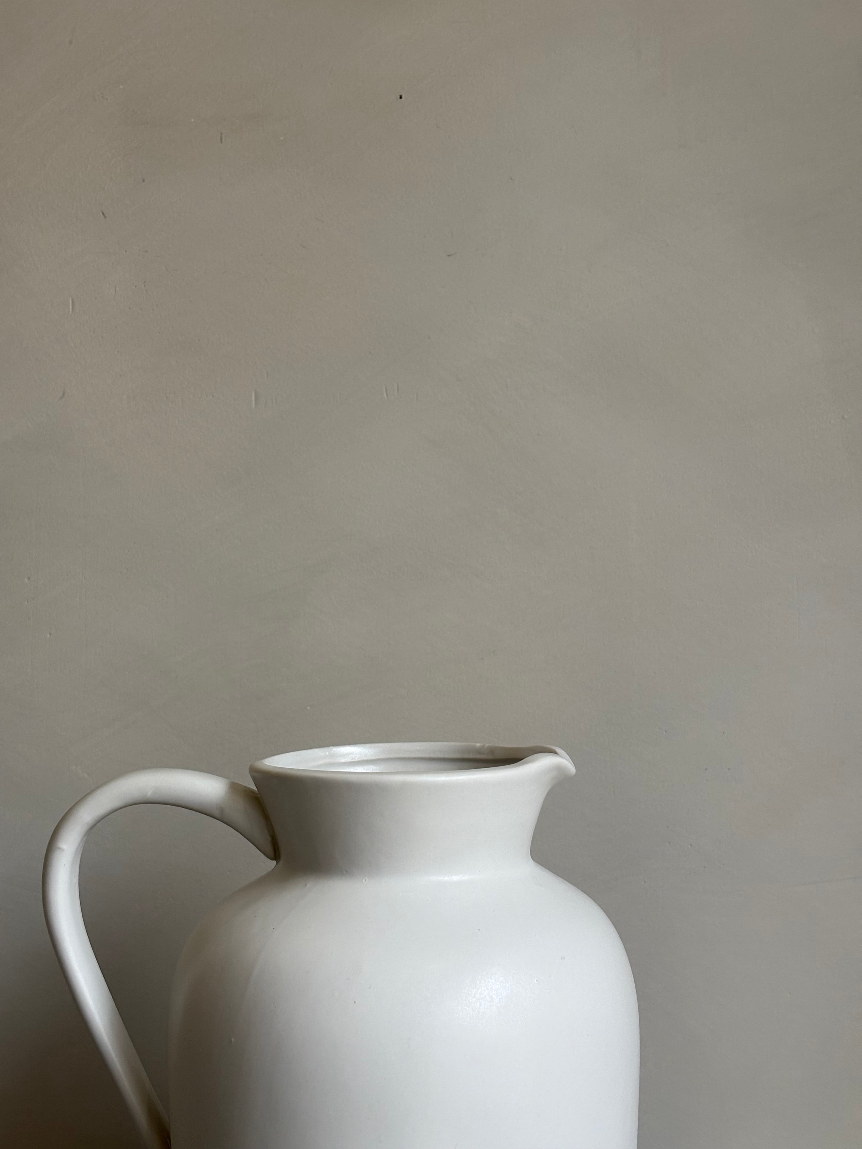 WHITE CERAMIC PITCHER