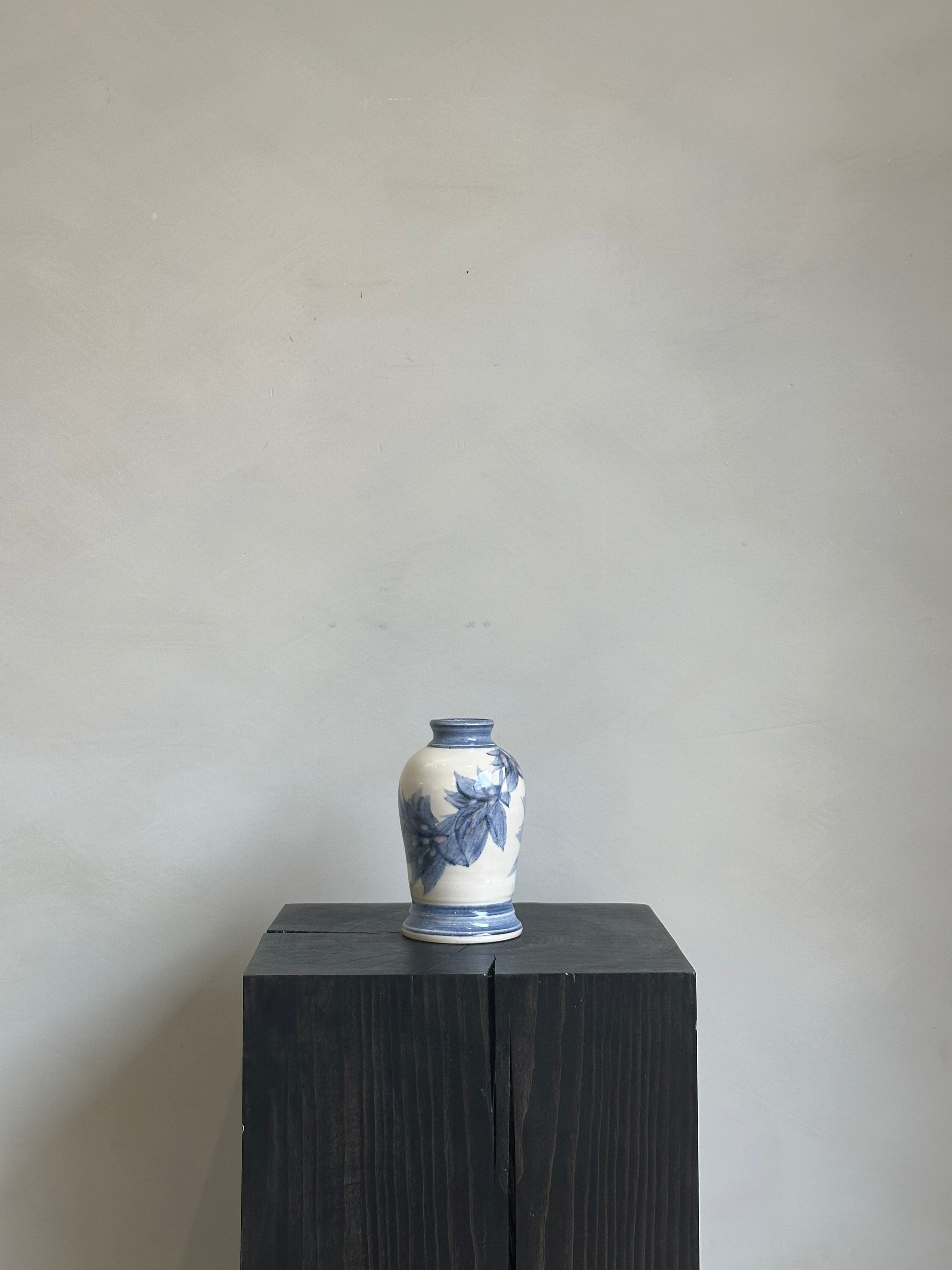 WHITE AND BLUE VASE