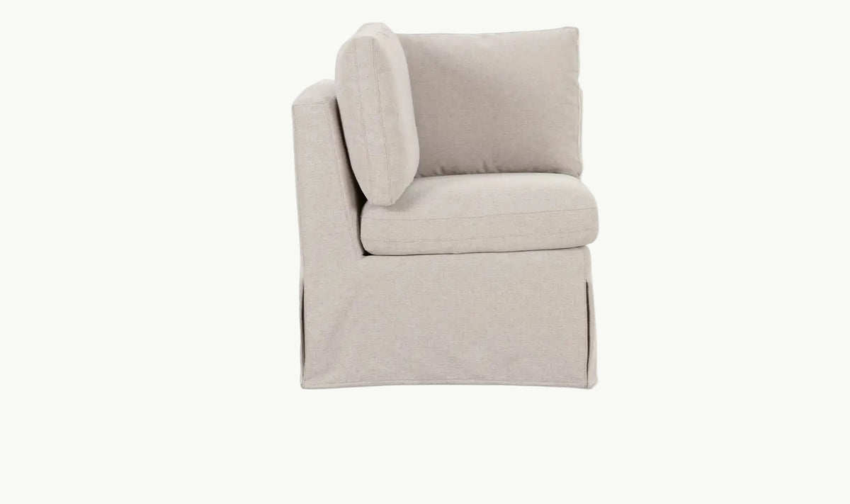 THE ALORA SLIPCOVER CORNER CHAIR