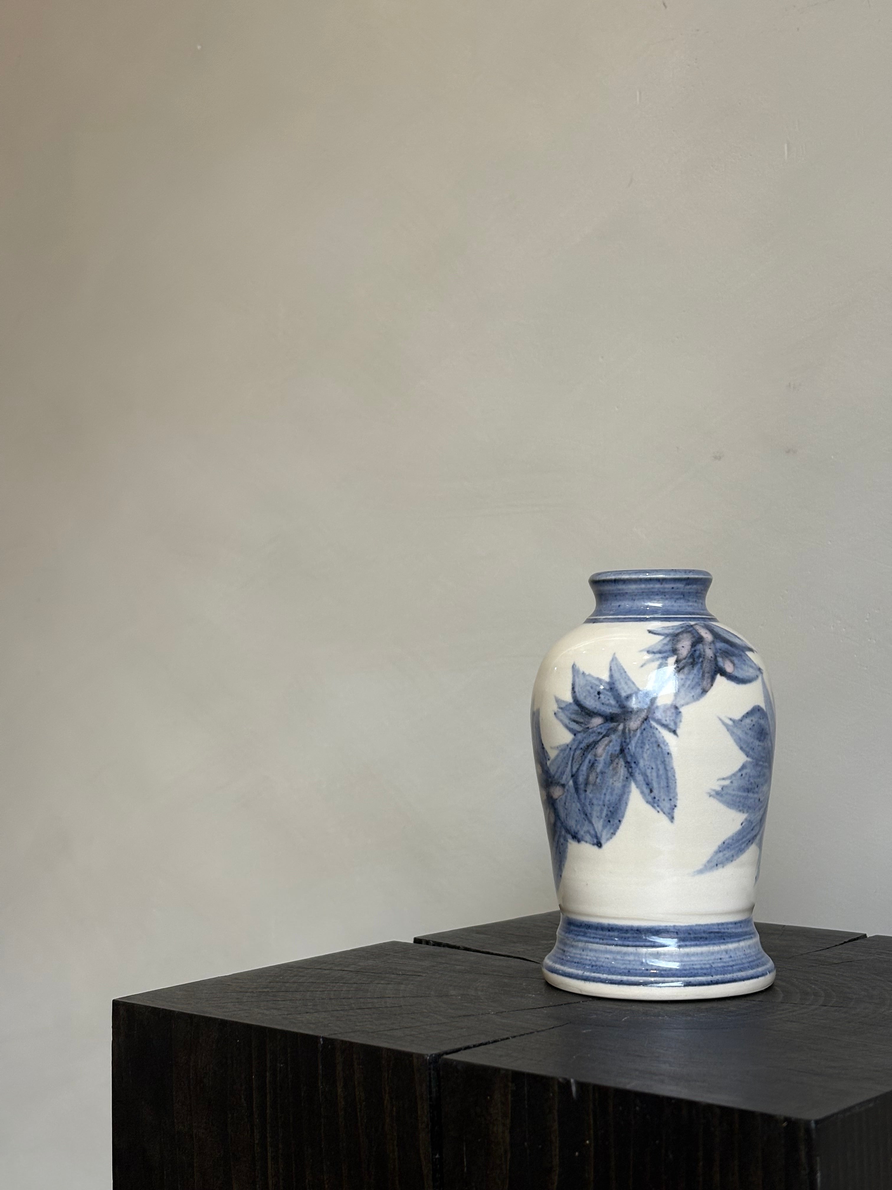 WHITE AND BLUE VASE