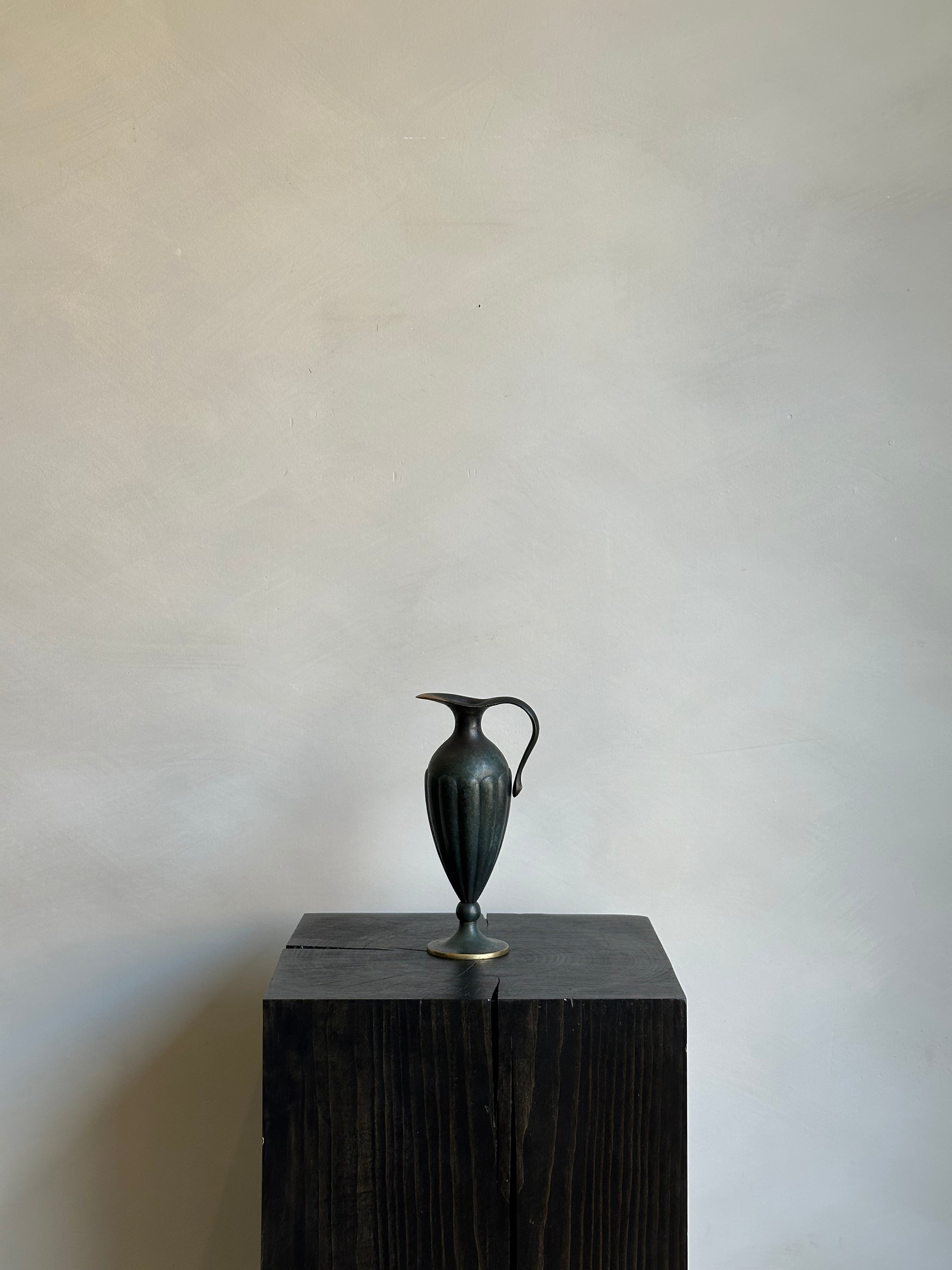 BLACK DECORATIVE PITCHER