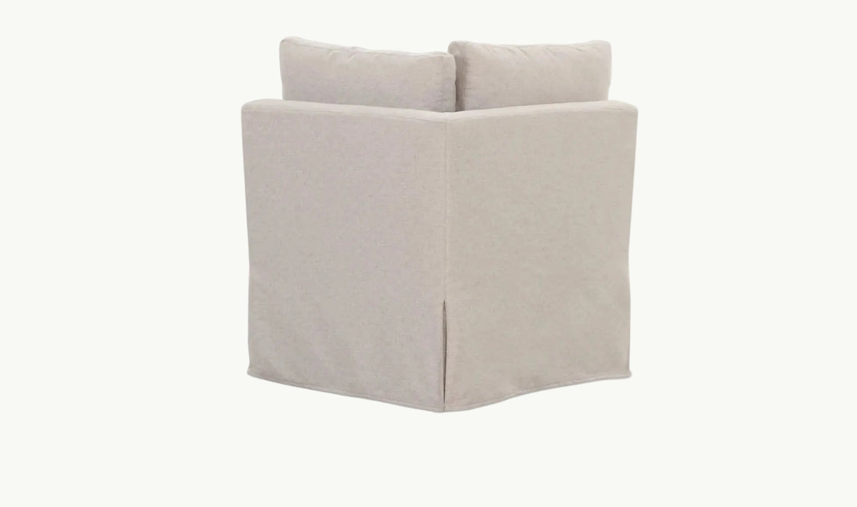 THE ALORA SLIPCOVER CORNER CHAIR